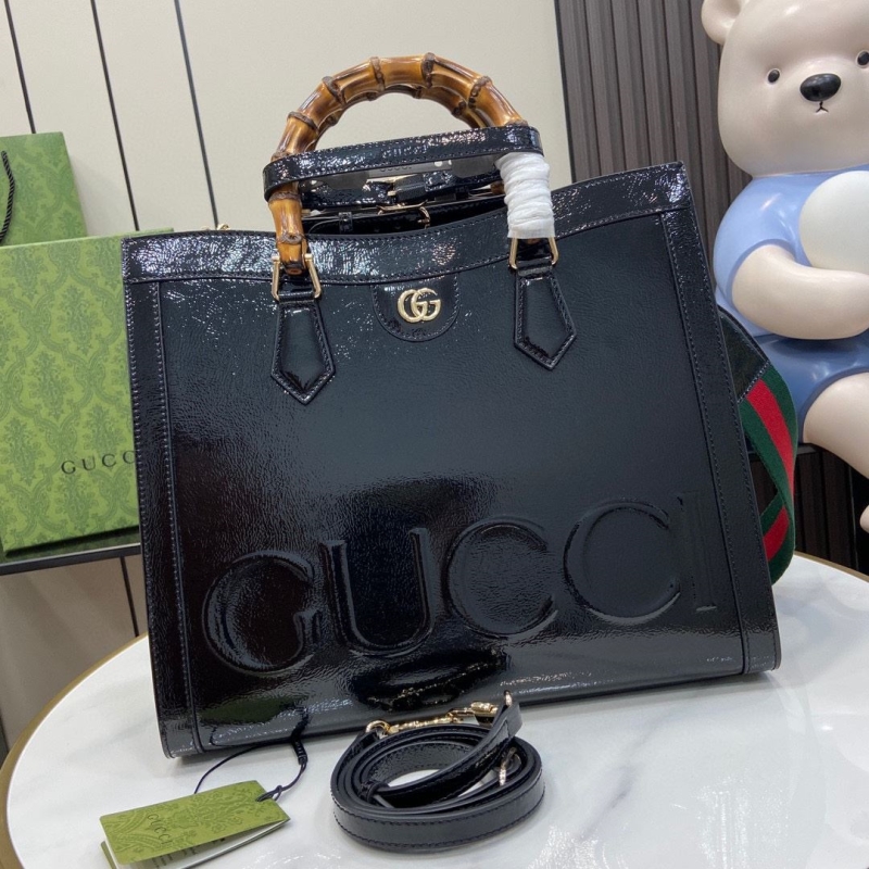 G*u*i top handle bags